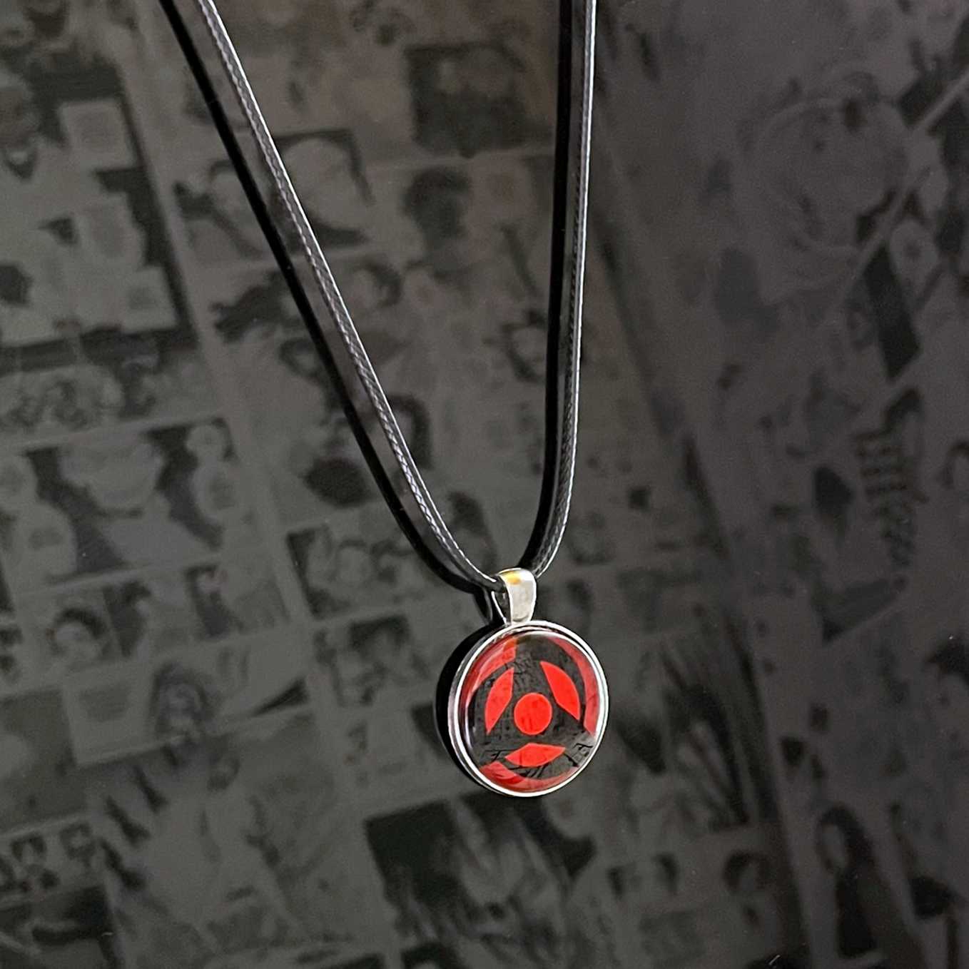 SoulAbiti Naruto Akatsuki Obito Mangekyou Sharingan Pendant (2.7 cm diameter) Ideal Gift for Naruto Shippuden Fans - SoulAbiti