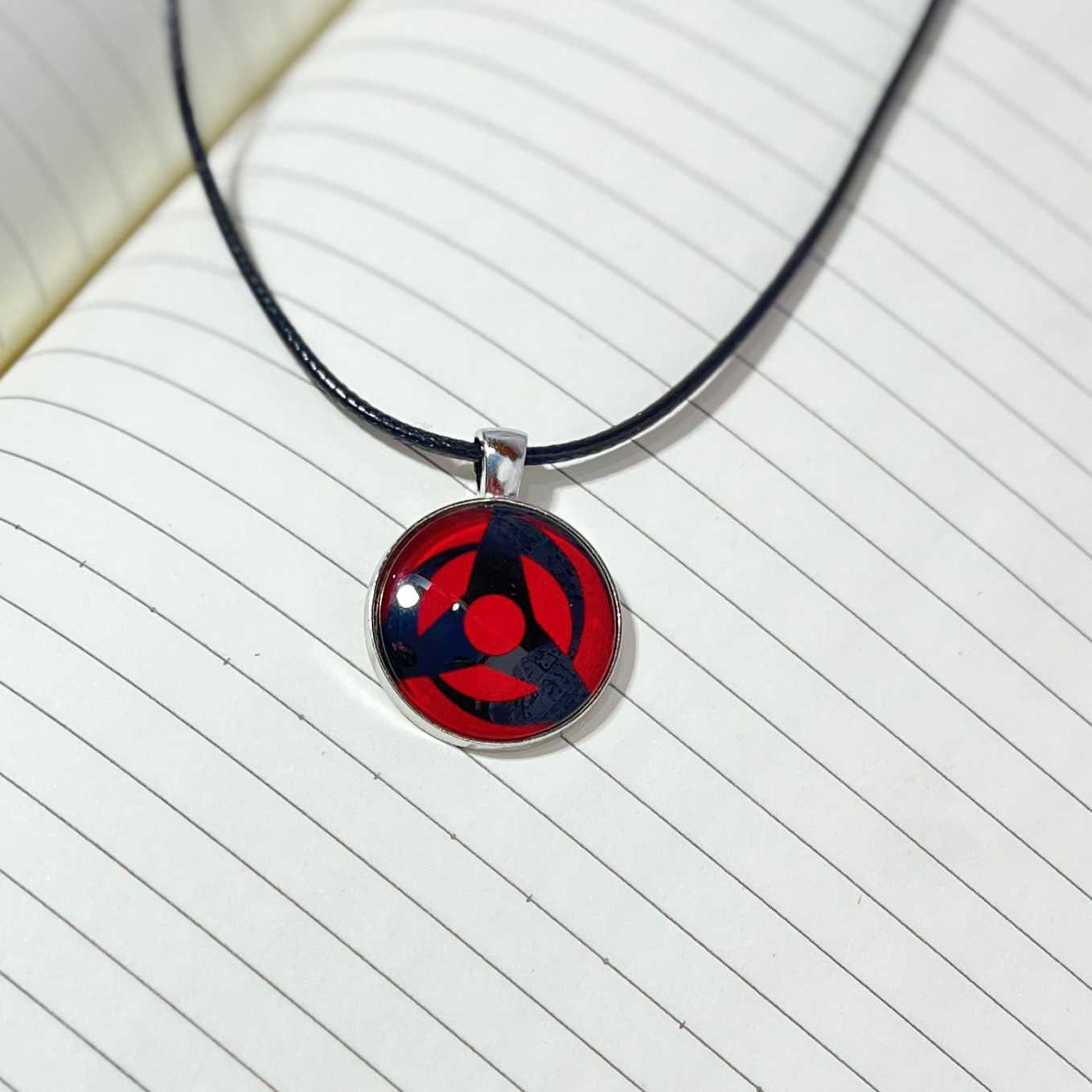 SoulAbiti Naruto Akatsuki Obito Mangekyou Sharingan Pendant (2.7 cm diameter) Ideal Gift for Naruto Shippuden Fans - SoulAbiti